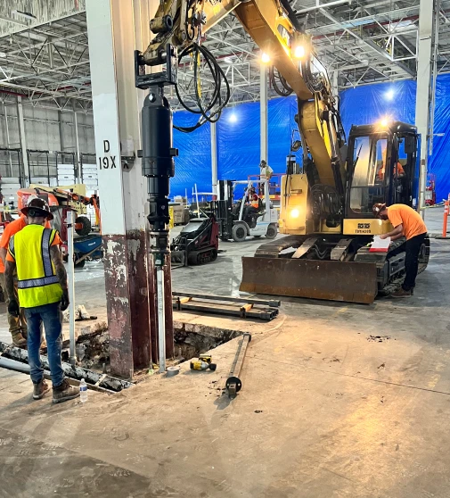 machine working on structural pillar
